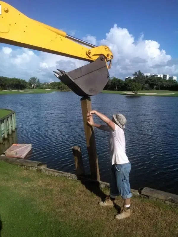 Seawall repair using JCB
